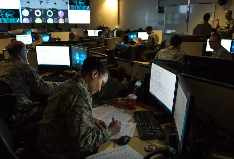 In December 2, 2017, cyber warfare operators monitor cyber attacks at Warfield Air National Guard Base in Middle River, MD.