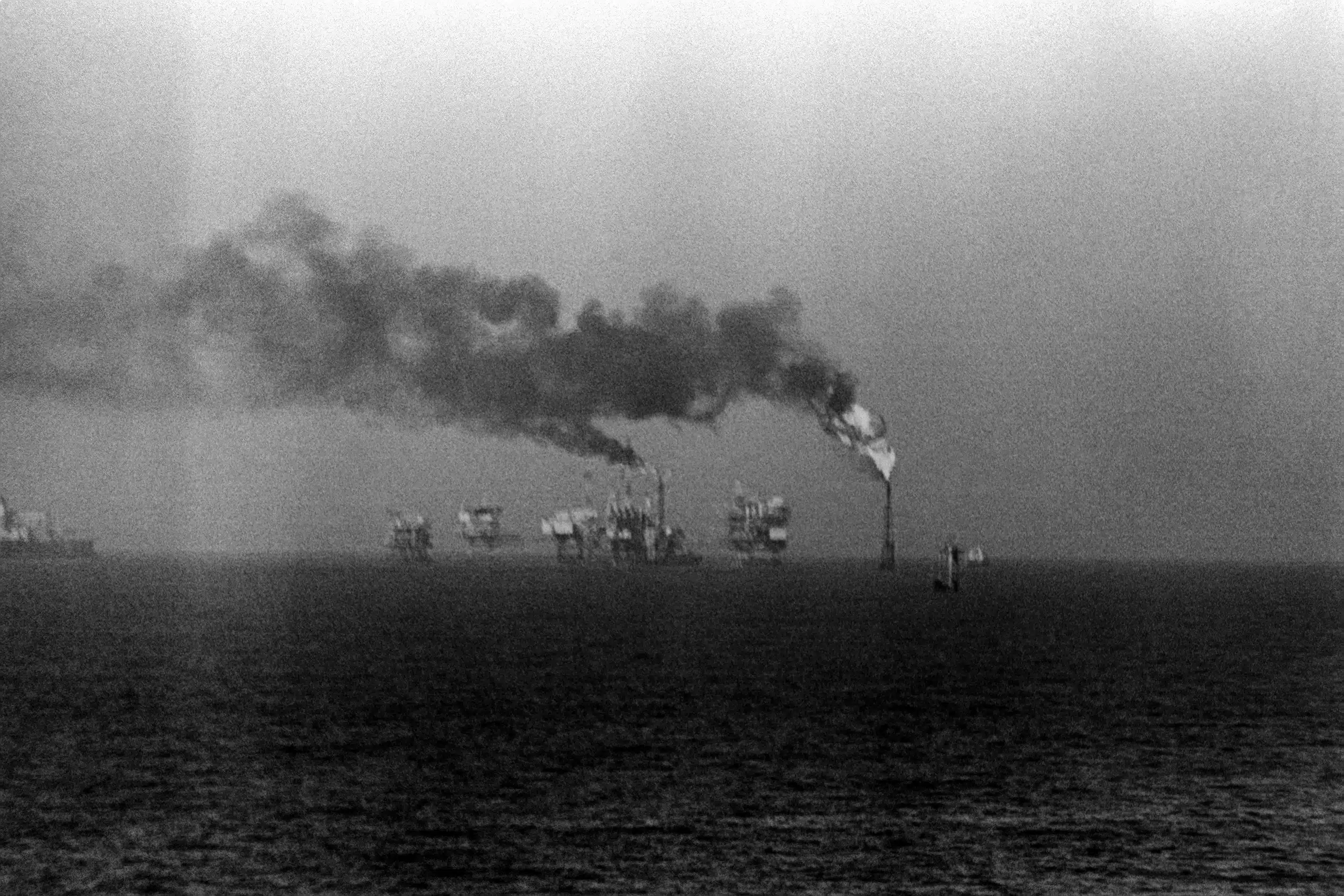 US Navy photograph depicting Operation Praying Mantis, April 14, 1988, showcasing Iranian oil platforms targeted in retaliation for the mining of USS Samuel B. Roberts (FFG-58) in the Persian Gulf.