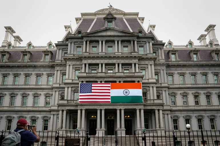 US-India flags fly at the White House. Since 2014, political metamorphosis of India under the BJP has diverged toward a Hindu-centric identity [Image via Reuters].