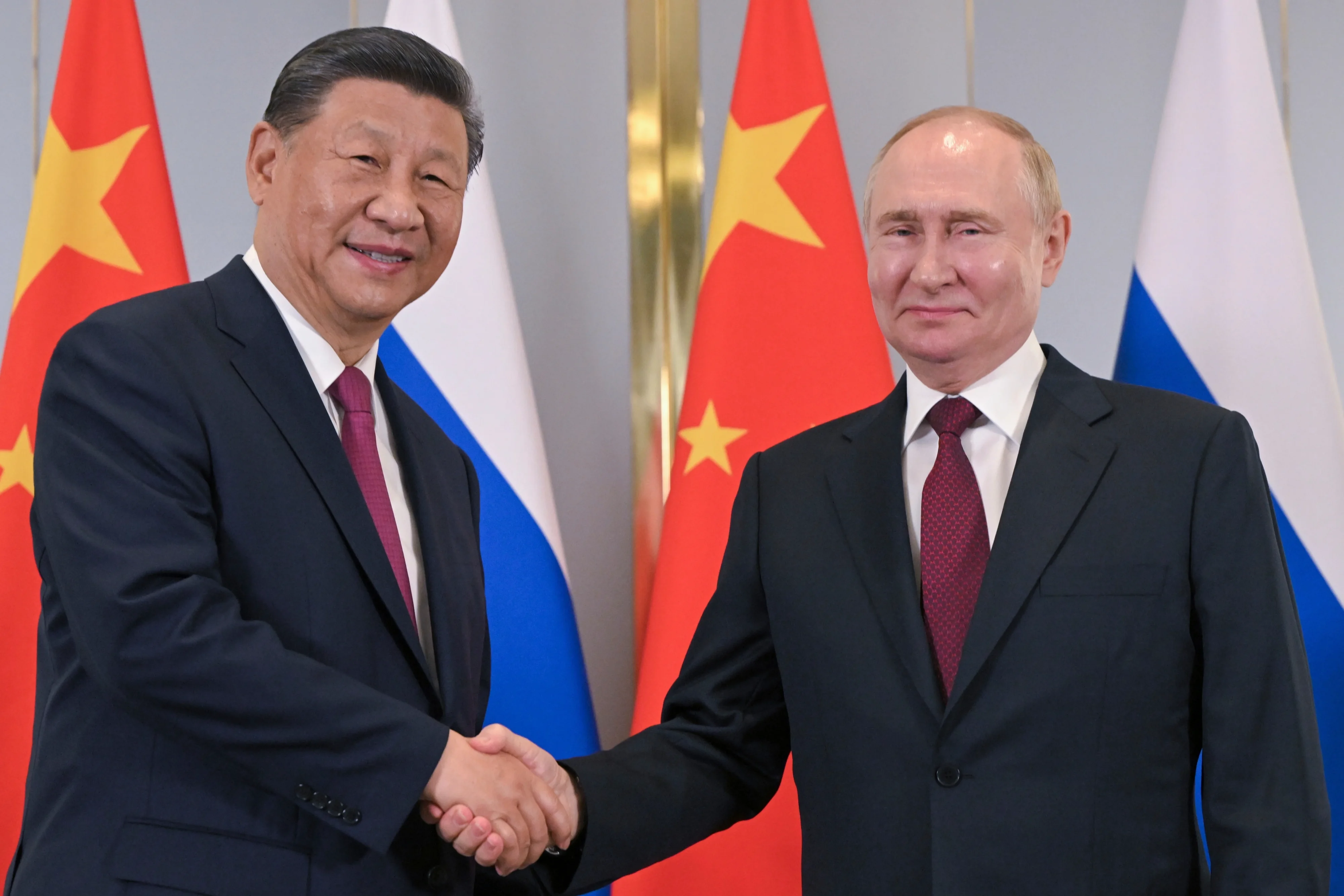 China's Xi and Russia's Putin at the 24th summit of the Shanghai Cooperation Organization (SCO) in Astana, Kazakhstan, July 3, 2024 [Image via AP].