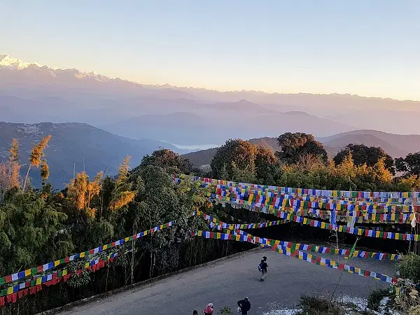 Tiger Hill, renowned for its panoramic views of the Himalayas at sunrise, is a popular destination near Darjeeling, India [Image via Deccan Herald].