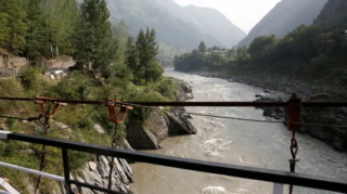 Jammu & Kashmir: The Neelam River flows between Pakistan and India administered Kashmir in Teetwal [Reuters].