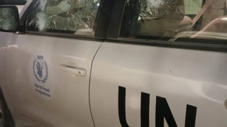 WFP halts operations in Gaza after Israeli gunfire strikes their vehicle near a checkpoint, despite secured clearance.