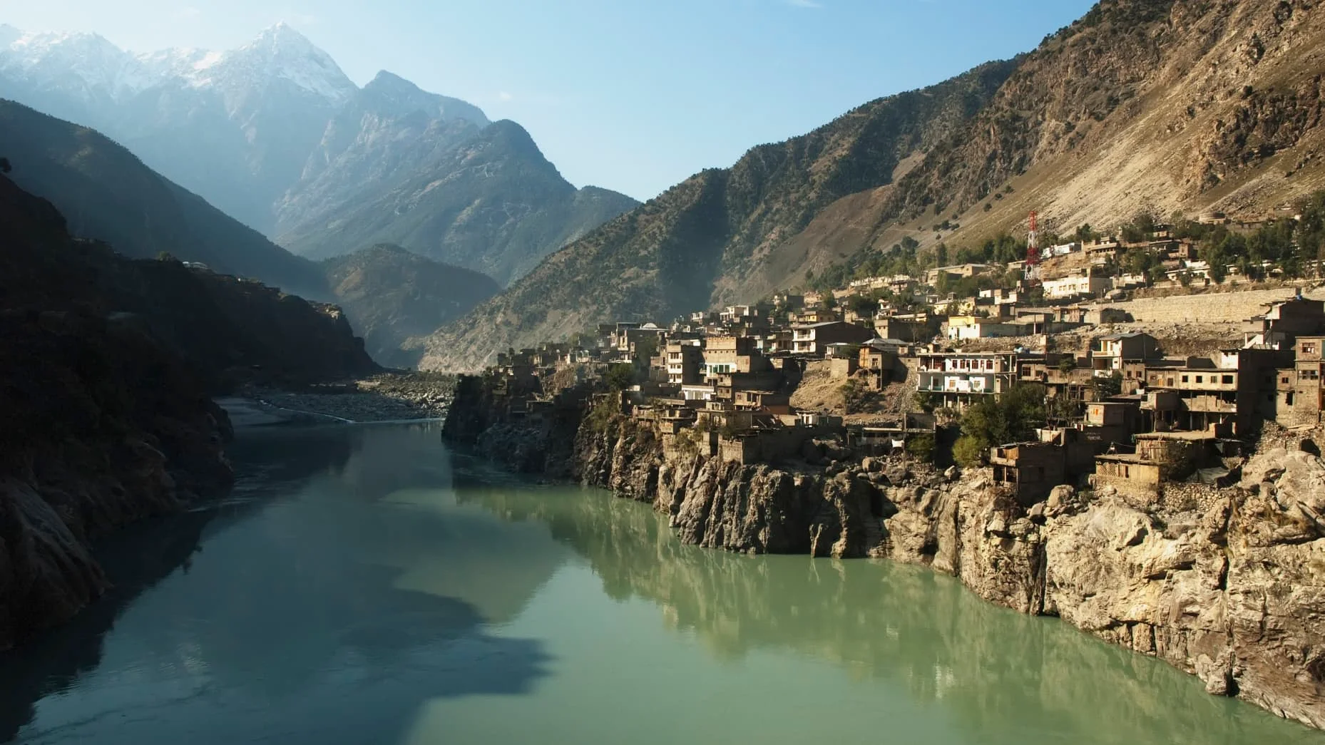 The Indus River flowing through the town of Dasu, Pakistan, highlighting the significance of the Indus Water Treaty in managing water resources in the region. [Getty Images].