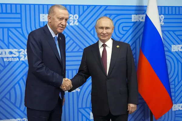 Russian President Vladimir Putin meets with Turkish President Recep Tayyip Erdogan on the sidelines of the BRICS summit in Kazan, Russia. [AP]