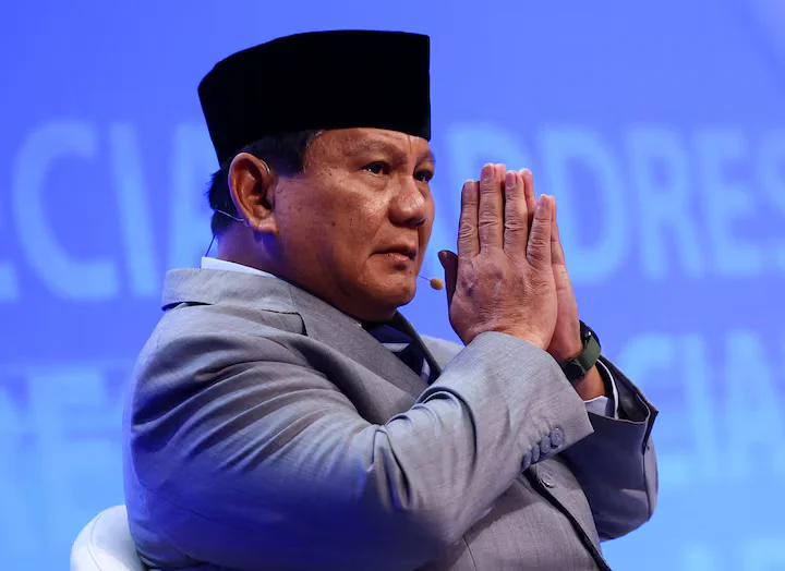 Prabowo Subianto, Indonesia's new president, faces scrutiny over his past and promises to unify the nation while boosting growth.