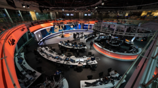 The newsroom of Al Jazeera English TV channel, Doha, Qatar [Image via Alamy Stock Photo]