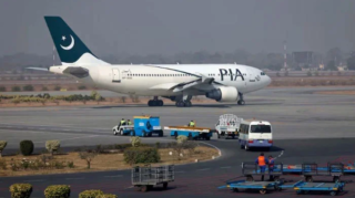 A Pakistan International Airlines (PIA) plane prepares to take-off at Alama Iqbal International Airport in Lahore as the country embarks for PIA privatisation. [Image via Reuters/File]