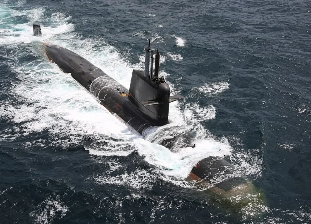 Indian Navy rescues 11 after fishing vessel collides with Scorpene-class naval submarine off Goa coast; 2 still missing. [Image via NDTV]