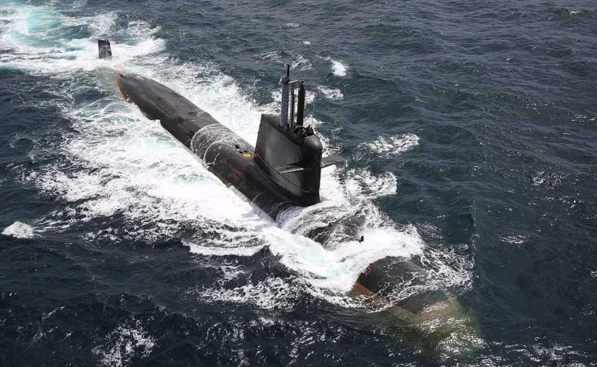 Indian Navy rescues 11 after fishing vessel collides with Scorpene-class naval submarine off Goa coast; 2 still missing. [Image via NDTV]