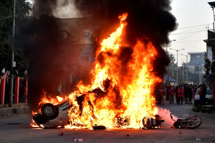 23 arrested in violent Manipur clashes as protests and unrest escalate between Meitei and Kuki communities amid curfew. [Image via Reuters]