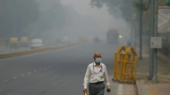 Delhi faces 'severe' air pollution, with record AQI levels causing flight disruptions and poor visibility. [Image via Reuters]