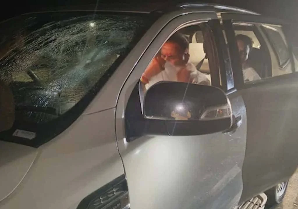 Former Maharashtra Home Minister Anil Deshmukh injured in stone attack on his car during election campaign in Nagpur. [Image via NDTV]
