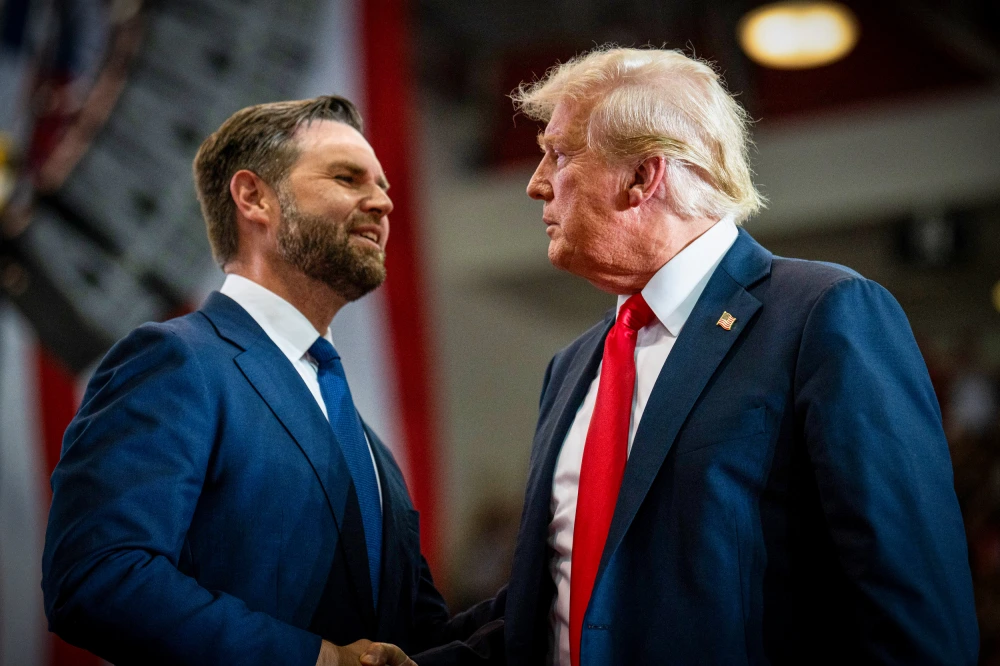 JD Vance and Donald Trump in St. Cloud, Minnesota, on July 27. [Stephen Maturen / Getty Images]