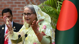 Bangladesh requests India's extradition of Sheikh Hasina on charges of crimes against humanity following violent protests. [Image via AFP/File]