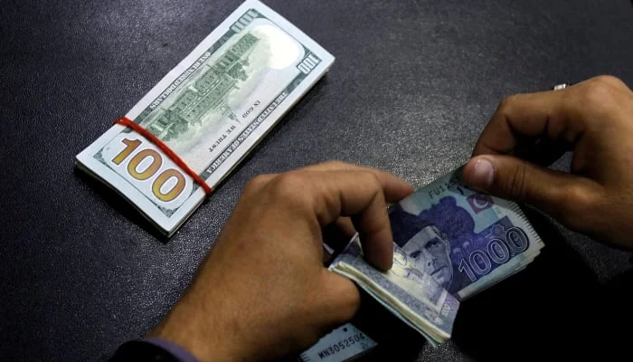 Pakistan records $729M current account surplus in Nov, the highest in 10 years, driven by reduced deficits and strong remittances [Image via Reuters]