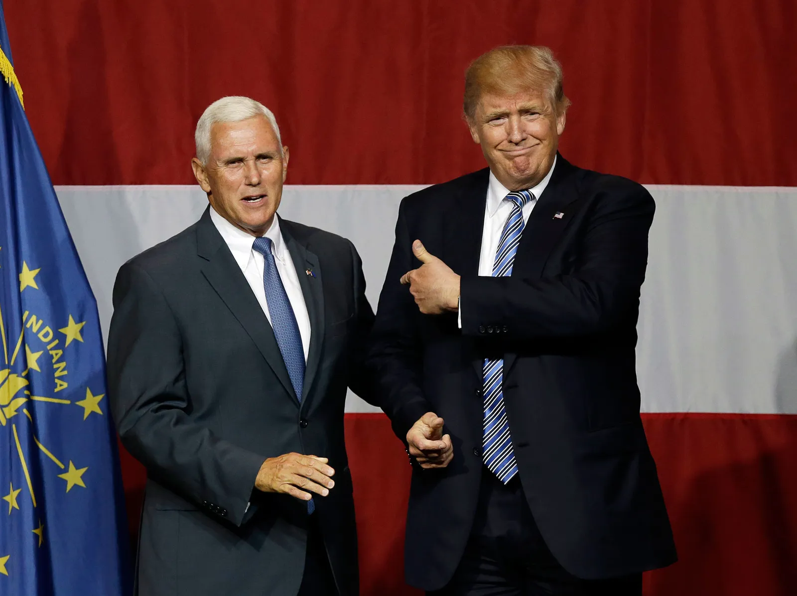 Republican vice presidential candidate Mike Pence with Trump. [Image via AP]