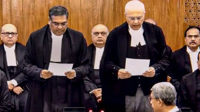 Justice Manmohan sworn in as Supreme Court judge, bringing the court's strength to 33 of 34 sanctioned judges. [Image via Indian Express]