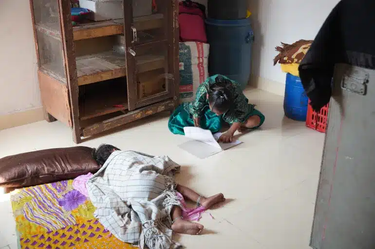 Salma Bano’s children in the relocated home they’ve been moved to – far from the school they used to go to, in Akbar Nagar, Uttar Pradesh [Al Jazeera]