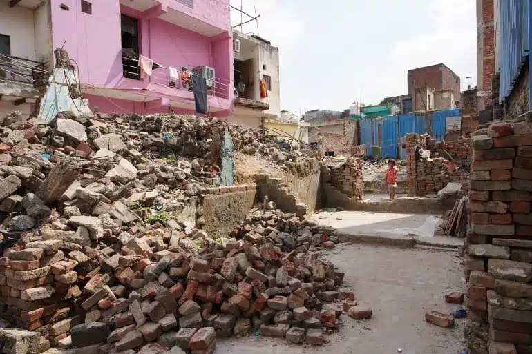 Shahid Malik’s demolished home in southwest Delhi. Days after the demolition, Malik also lost his infant son, who died from cardiovascular complications made worse, doctors said, by the dust he inhaled once homeless [Al Jazeera]