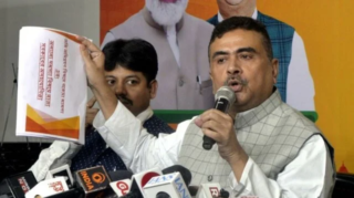 Suvendu Adhikari accuses West Bengal govt of obstructing BSF projects along Bangladesh border, raising security concerns. [Image via Indian Express]