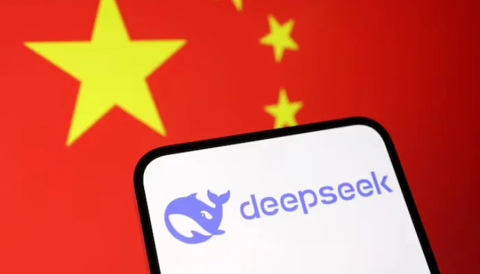 Chinese AI startup DeepSeek challenges US tech giants with a low-cost model, sparking investor scrutiny and price war fears. [Image via Reuters]