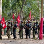 Chhattisgarh police killed 14 Naxalites, including a leader with ₹1 crore bounty, raising concerns over state violence and authoritarianism. [Image via South China Morning Post]