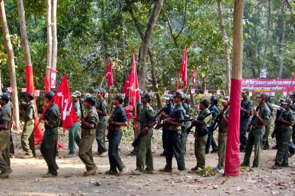 Chhattisgarh police killed 14 Naxalites, including a leader with ₹1 crore bounty, raising concerns over state violence and authoritarianism. [Image via South China Morning Post]