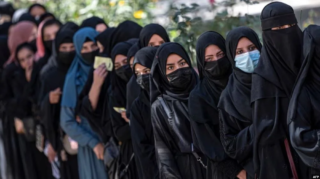 Afghan women to pursue education in Pakistan with Taliban's conditional approval; scholarships to boost bilateral ties. [Image via AFP]