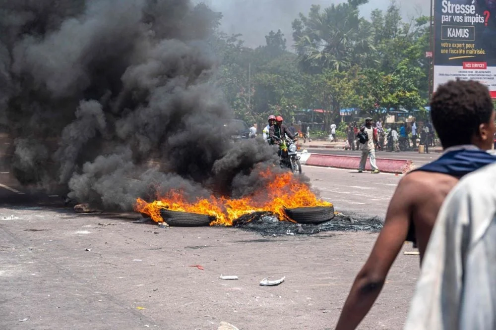 Protesters in Kinshasa targeted US, France, and Belgium embassies over M23 rebel conflict, sparking international outcry. [Image via AFP]