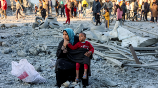 Israel and Hamas reach a ceasefire agreement after 15 months of conflict, offering hope for peace and humanitarian aid. [Image: AFP via Getty]