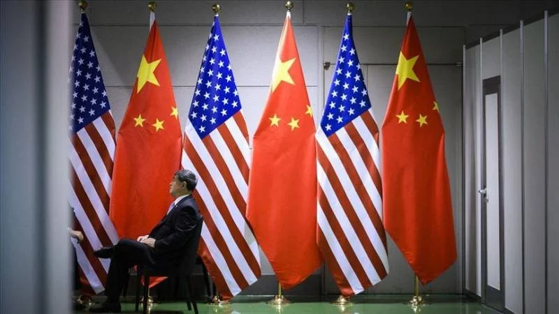 Trump plans 10% tariff on Chinese imports, citing fentanyl crisis; analysts warn of potential trade war risks. [Image via The Nation]