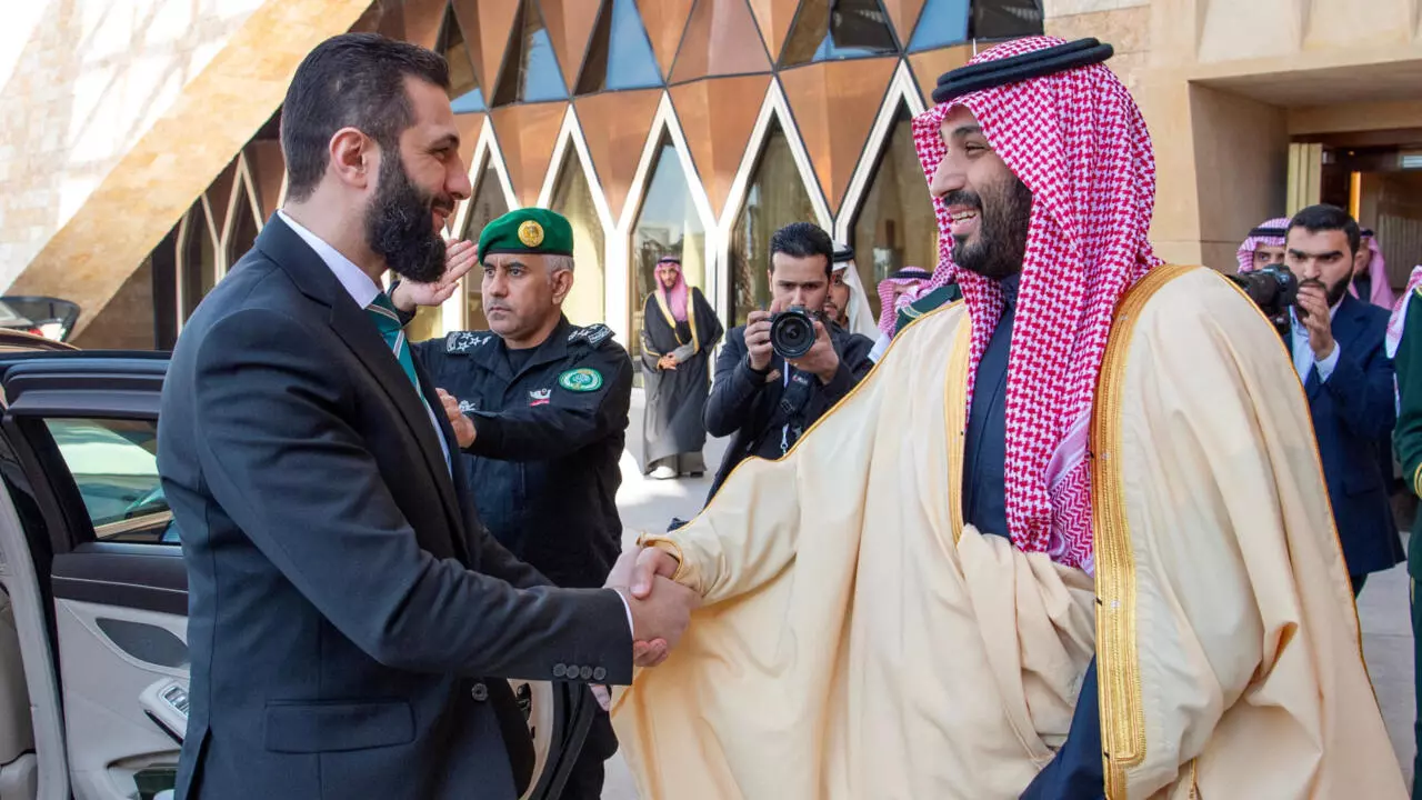 Syria's interim president Ahmed al-Sharaa visits Saudi Arabia, seeking Gulf support for reconstruction and stability. [Image via Reuters]