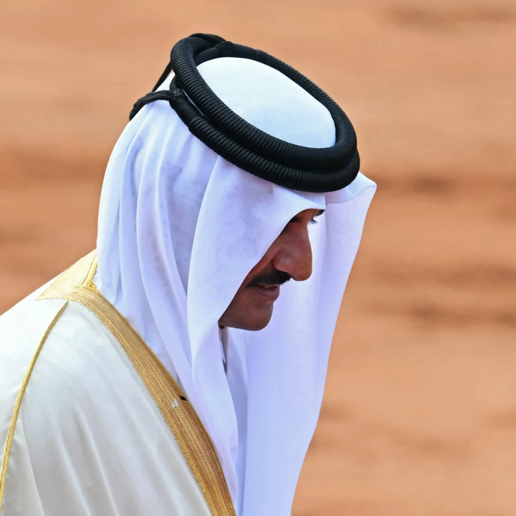 Qatar's Emir embarks on a strategic tour to India and Iran, boosting trade, diplomacy, and regional influence amid rivalries. [Image via AFP]