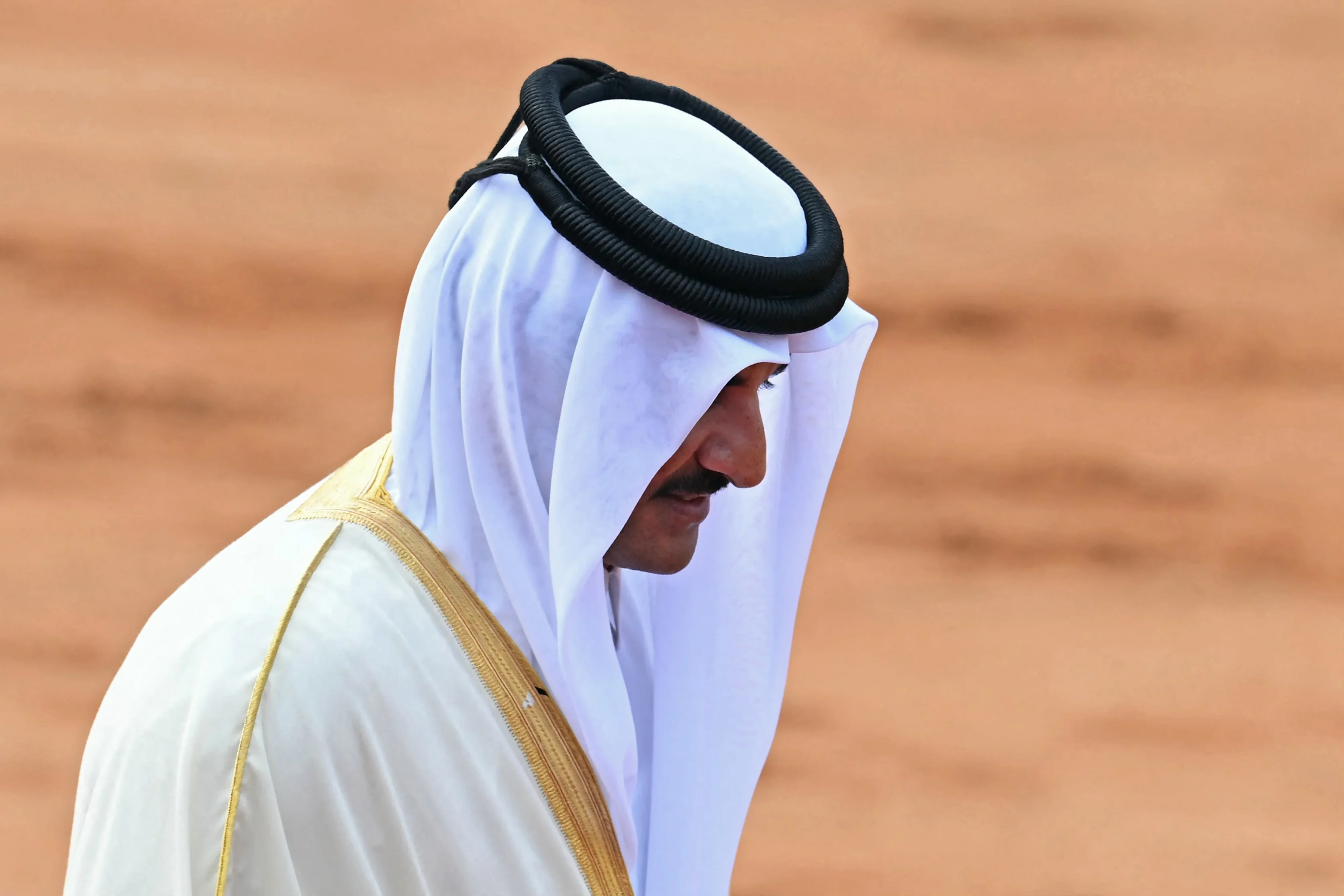 Qatar's Emir embarks on a strategic tour to India and Iran, boosting trade, diplomacy, and regional influence amid rivalries. [Image via AFP]