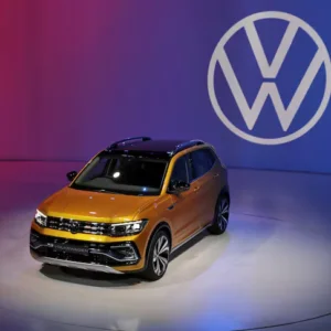 Volkswagen challenges a $14 billion tax demand in India, highlighting concerns over retrospective tax laws. [Image via Reuters]