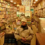 Indian police raid bookstores in Kashmir, seizing 650+ books, sparking outrage over suppression of free speech and dissent.