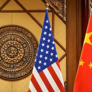 China condemns Trump's 10% tariff, files WTO challenge, but signals openness to talks amid trade tensions with the U.S. [Image via Reuters]