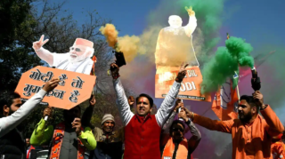 BJP's landslide victory in Delhi 2025 reshapes more than just politics. Is this a dawn of majoritarian era, or a crisis for India's secular fabric? [Image via AFP]