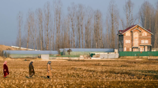 Kashmir's farmers resist land takeover as highways and townships reshape the region under India's development drive. [Image via AFP]