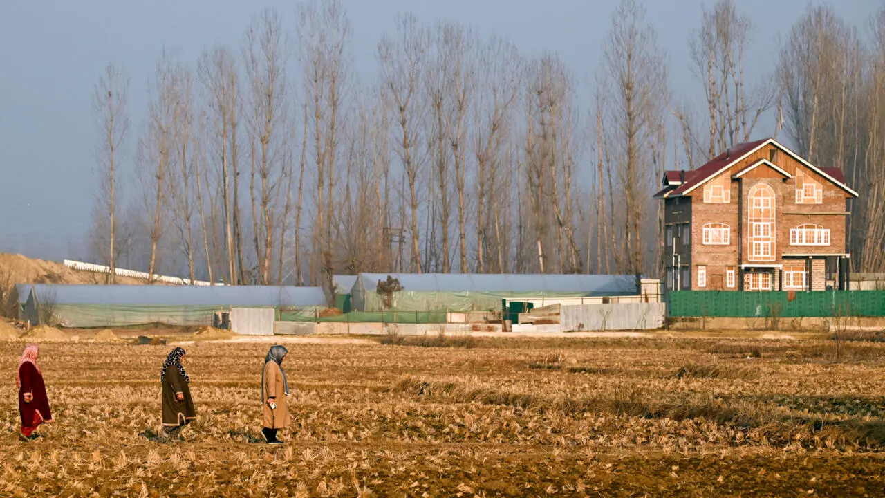 Kashmir's farmers resist land takeover as highways and townships reshape the region under India's development drive. [Image via AFP]