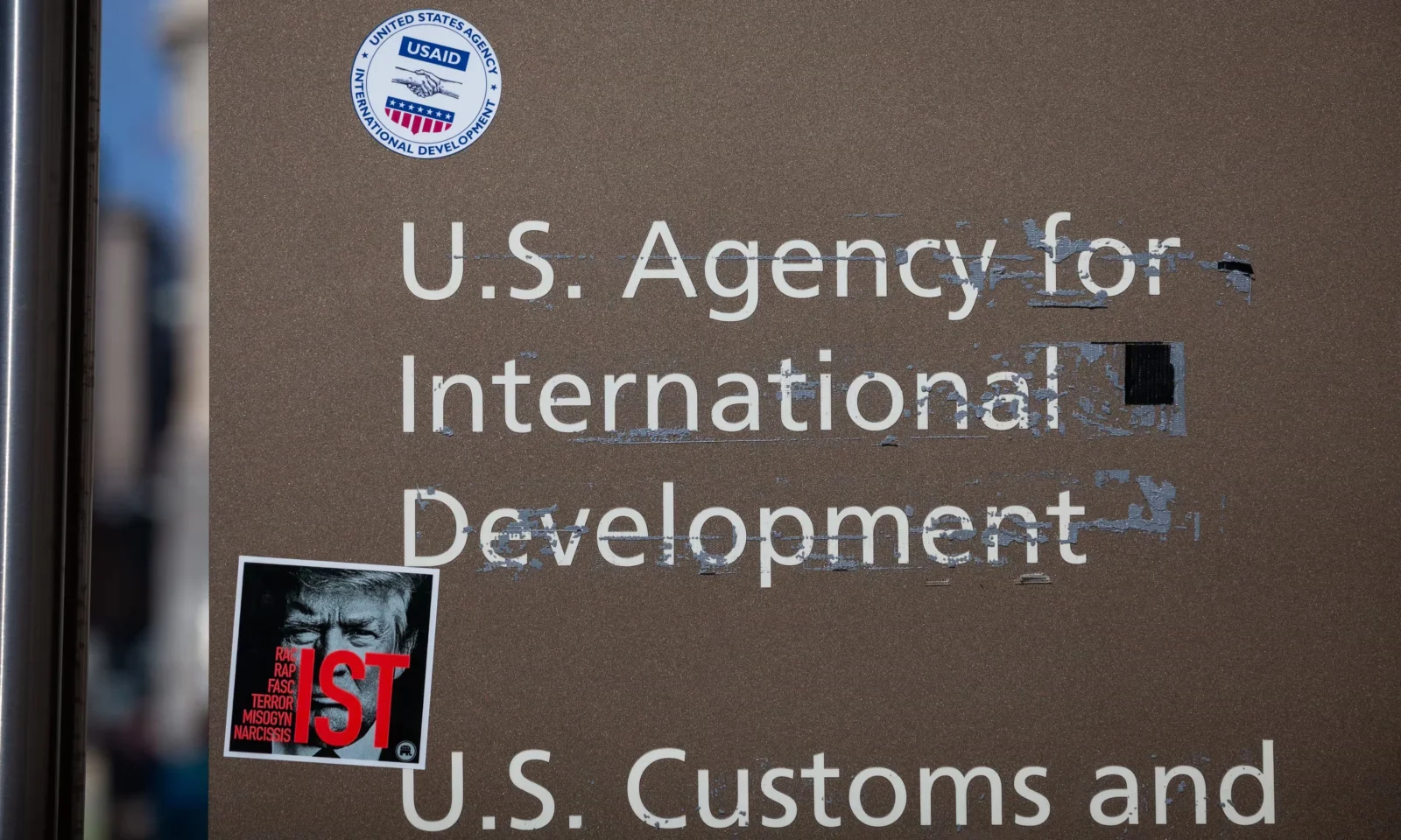 Judge blocks USAid shutdown, ruling Musk and Doge likely violated the Constitution; Trump admin ordered to reverse actions. [Image via Shutterstock]