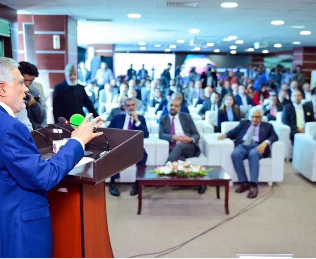 Deputy PM Ishaq Dar affirms Pakistan's economic growth, aims for G20 by 2030, and highlights CCP's role in fair competition. [Image via Profit]