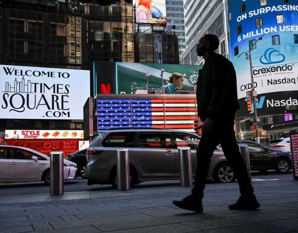 Trump pauses global tariffs for 90 days, hikes China's to 125%, triggering global reactions and market volatility. [Image via China Daily]