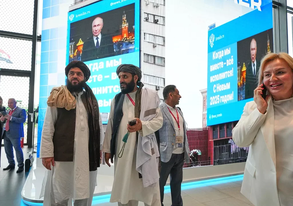 Members of the Taliban stand in front of TV screens as they attend the St. Petersburg International Economic Forum in St. Petersburg, Russia, Wednesday, June 18, 2025 AP Photo