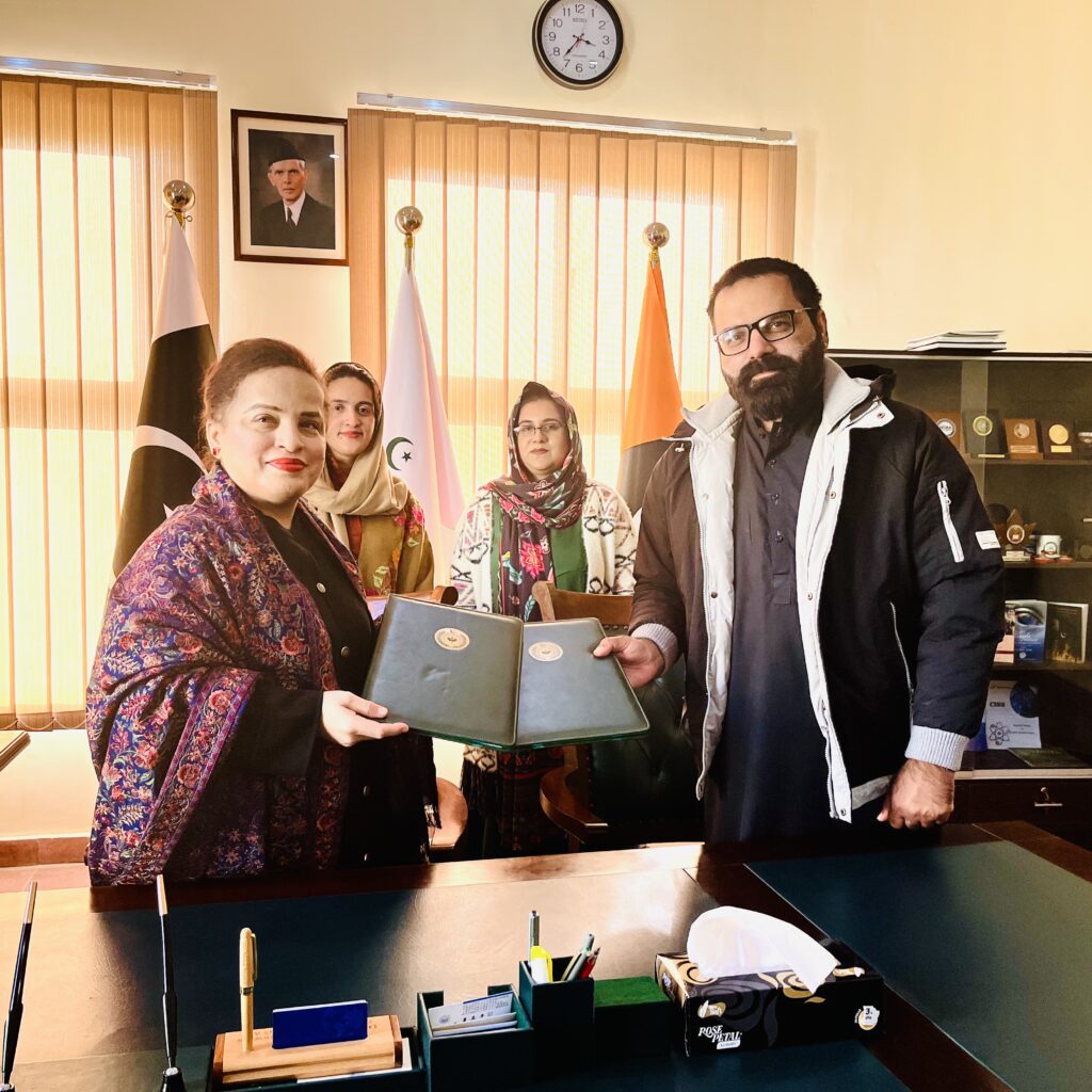 Director General South Asia Times Salman Javed and Executive Director CISS AJK Dr Asma signing Memorandum of Understanding formalizing research collaboration.