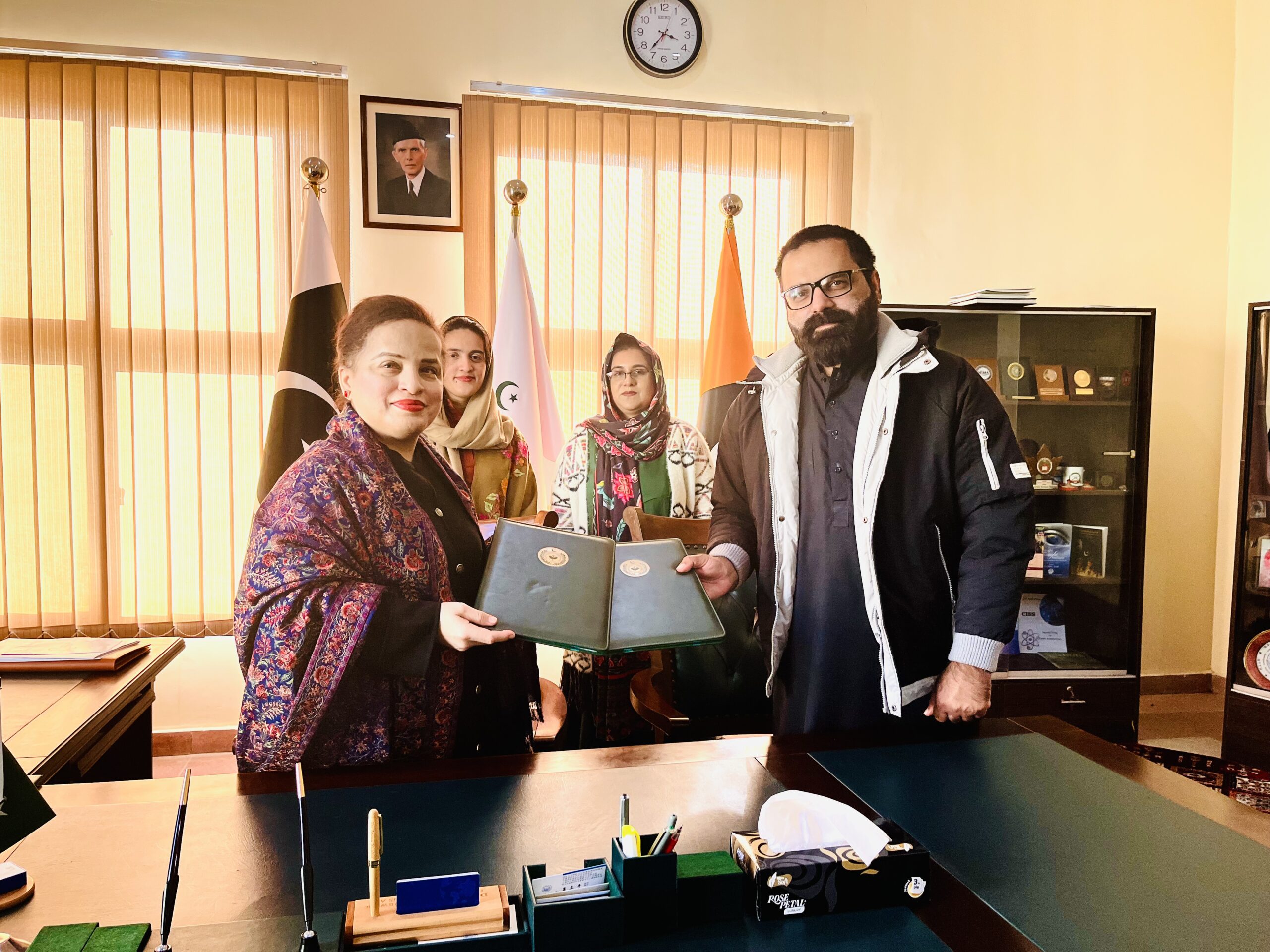 Director General South Asia Times Salman Javed and Executive Director CISS AJK Dr Asma signing Memorandum of Understanding formalizing research collaboration.