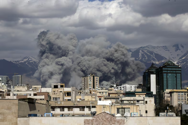 Smoke rises after a series of explosions in Tehran, Iran on March 01, 2026.