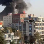 Smoke rising from a building in the Taimani area of Kabul after Pakistani air strikes