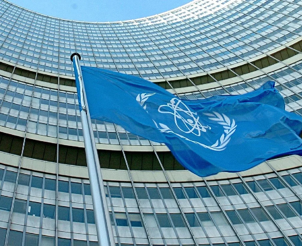 The flag of the International Atomic Energy Agency IAEA waves in front of the IAEA